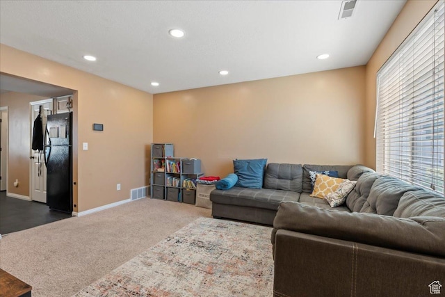 1322 E 6175 S, South Ogden, UT 84405 - living area featuring recessed lighting, visible vents, dark carpet, and baseboards