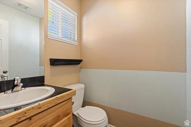 1322 E 6175 S, South Ogden, UT 84405 - bathroom with visible vents, toilet, and vanity