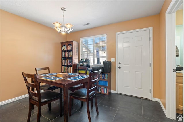 1322 E 6175 S, South Ogden, UT 84405 - dining room featuring dark tile patterned flooring, baseboards, visible vents, and a chandelier