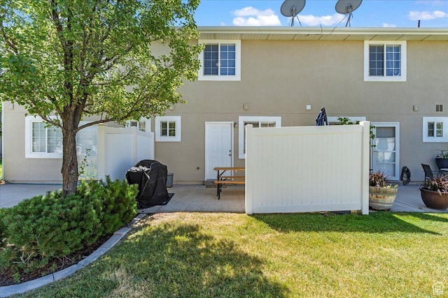 1322 E 6175 S, South Ogden, UT 84405 - rear view of house with stucco siding, fence, a yard, and a patio area