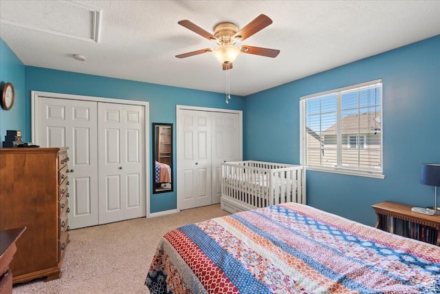 1322 E 6175 S, South Ogden, UT 84405 - bedroom featuring carpet flooring, attic access, a textured ceiling, and multiple closets