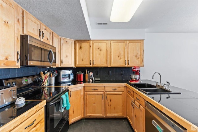 1322 E 6175 S, South Ogden, UT 84405 - kitchen with stainless steel appliances, tile countertops, and light brown cabinetry