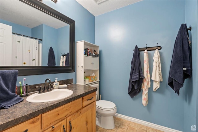 1322 E 6175 S, South Ogden, UT 84405 - bathroom with baseboards, toilet, vanity, and a textured ceiling