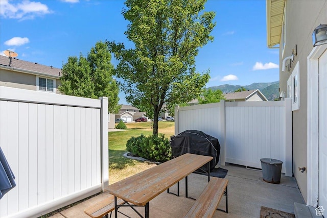 1322 E 6175 S, South Ogden, UT 84405 - view of patio / terrace featuring grilling area, a mountain view, and fence