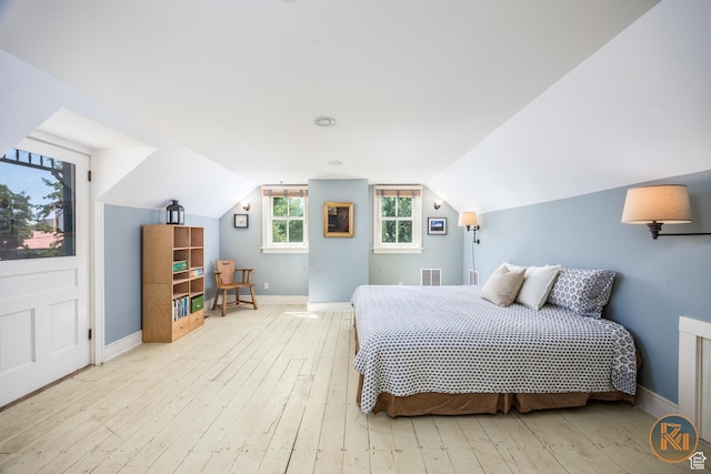 197 N 200 W, Kanab, UT 84741 - bedroom with vaulted ceiling, visible vents, baseboards, and light wood finished floors
