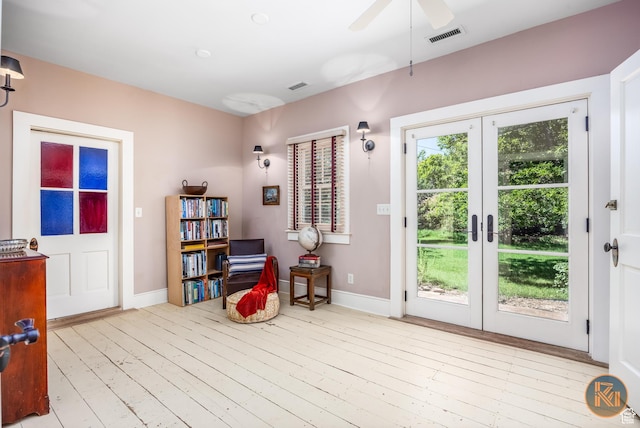 197 N 200 W, Kanab, UT 84741 - doorway with wood finished floors, visible vents, french doors, and baseboards
