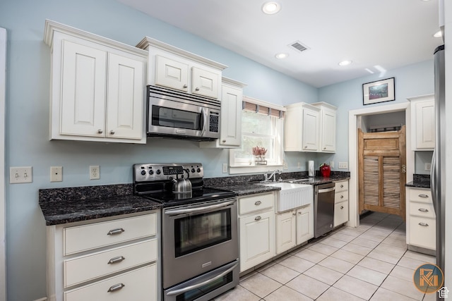 197 N 200 W, Kanab, UT 84741 - kitchen with light tile patterned floors, visible vents, recessed lighting, a sink, and stainless steel appliances