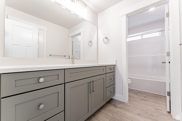 1015 N 3685 W Unit 247, Lehi, UT 84043 - full bathroom with vanity, wood finished floors, and bathtub / shower combination