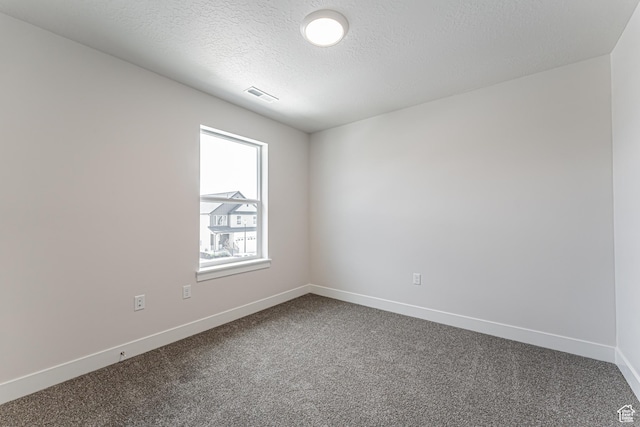 1015 N 3685 W Unit 247, Lehi, UT 84043 - empty room featuring dark colored carpet and a textured ceiling