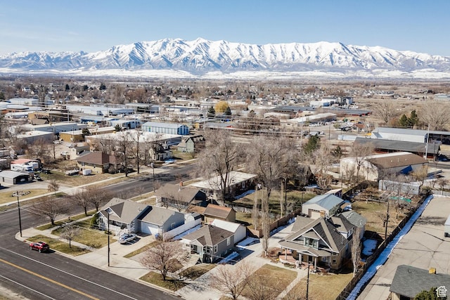 aerial view featuring a mountain view and a residential view