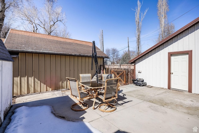view of patio / terrace with outdoor dining space and fence