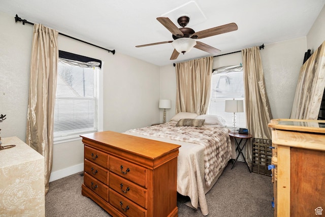bedroom featuring a ceiling fan, baseboards, and carpet floors