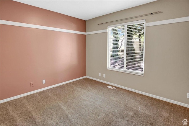5772 Oakwood Dr, South Ogden, UT 84405 - carpeted spare room featuring baseboards