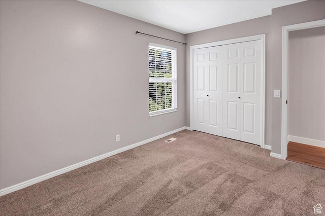 5772 Oakwood Dr, South Ogden, UT 84405 - unfurnished bedroom featuring carpet floors and a closet