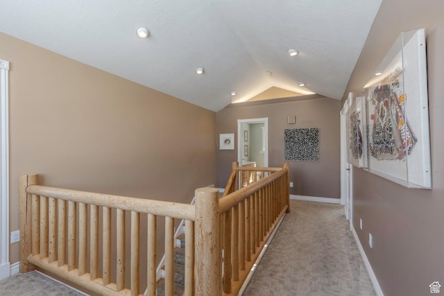 161 W Swiss Farm Way Unit 9, Midway, UT 84049 - corridor featuring carpet, vaulted ceiling, an upstairs landing, and baseboards