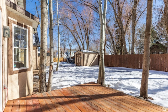 161 W Swiss Farm Way Unit 9, Midway, UT 84049 - snow covered deck featuring an outbuilding, a shed, and a fenced backyard