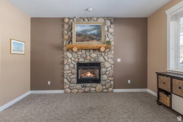 161 W Swiss Farm Way Unit 9, Midway, UT 84049 - carpeted living area with baseboards, plenty of natural light, and a stone fireplace
