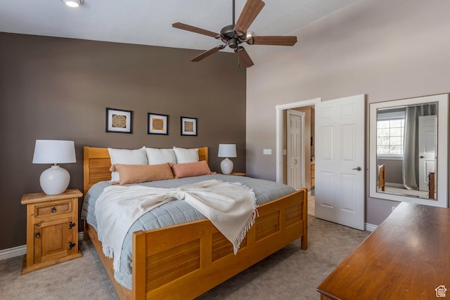 161 W Swiss Farm Way Unit 9, Midway, UT 84049 - bedroom with light colored carpet, high vaulted ceiling, baseboards, and ceiling fan