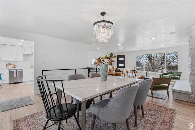 4375 S 2700 E, Holladay, UT 84124 - dining room featuring recessed lighting, light wood-type flooring, and a chandelier
