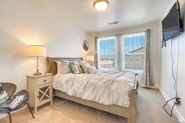 498 W 1225 N Unit 28, Cedar City, UT 84721 - bedroom with baseboards, visible vents, and light carpet