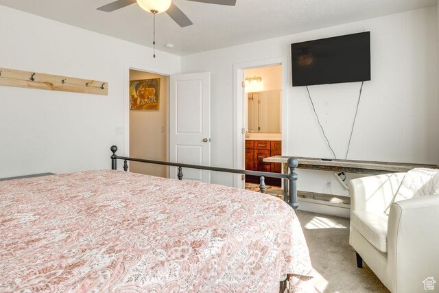 498 W 1225 N Unit 28, Cedar City, UT 84721 - bedroom featuring connected bathroom, carpet floors, and ceiling fan