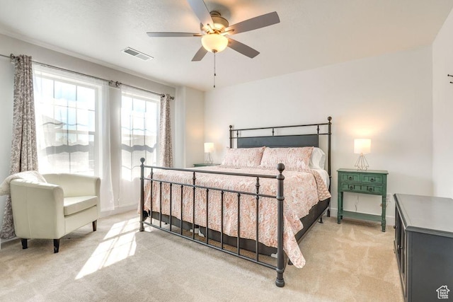 498 W 1225 N Unit 28, Cedar City, UT 84721 - bedroom featuring light carpet, visible vents, ceiling fan, and baseboards