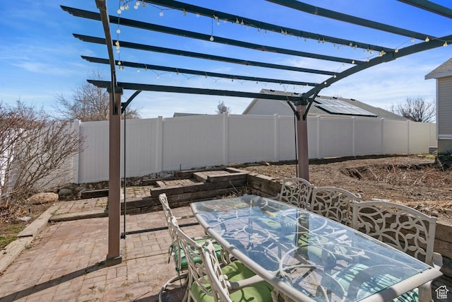 5964 W Jackling Way, West Jordan, UT 84081 - view of patio featuring outdoor dining area and a fenced backyard