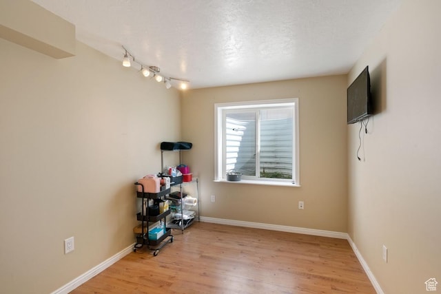 5964 W Jackling Way, West Jordan, UT 84081 - misc room with baseboards and wood finished floors