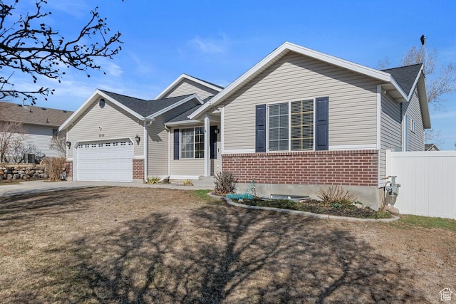 5964 W Jackling Way, West Jordan, UT 84081 - ranch-style home with a garage, brick siding, driveway, and fence