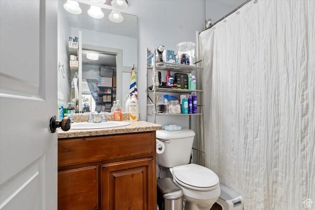 3635 E Clear Rock Rd Unit 4, Eagle Mountain, UT 84005 - bathroom with a shower with shower curtain, toilet, and vanity