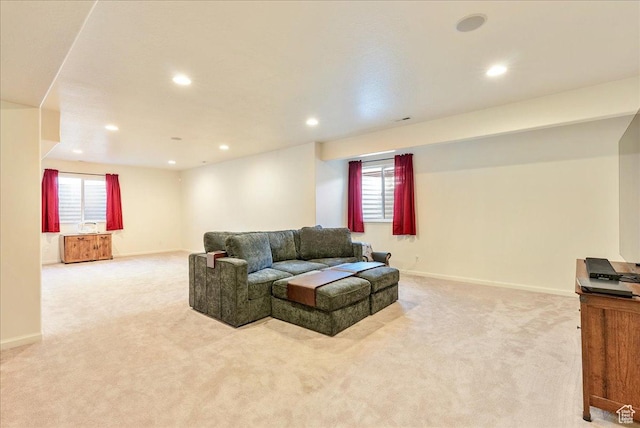 5663 W Yukon Park Ln S, Herriman, UT 84096 - living room featuring light colored carpet, recessed lighting, baseboards, and plenty of natural light