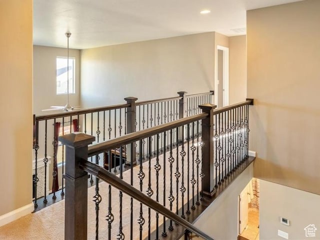 5663 W Yukon Park Ln S, Herriman, UT 84096 - corridor with an upstairs landing, baseboards, recessed lighting, and carpet floors
