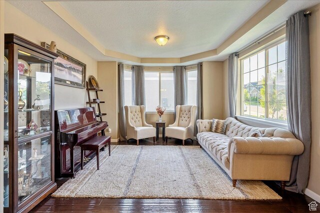 5663 W Yukon Park Ln S, Herriman, UT 84096 - living room with baseboards, wood finished floors, and a textured ceiling