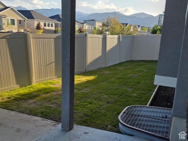 5663 W Yukon Park Ln S, Herriman, UT 84096 - view of yard featuring a mountain view, a residential view, and a patio