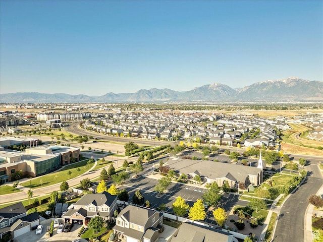 5663 W Yukon Park Ln S, Herriman, UT 84096 - aerial overview of property's location with nearby suburban area and a mountainous background