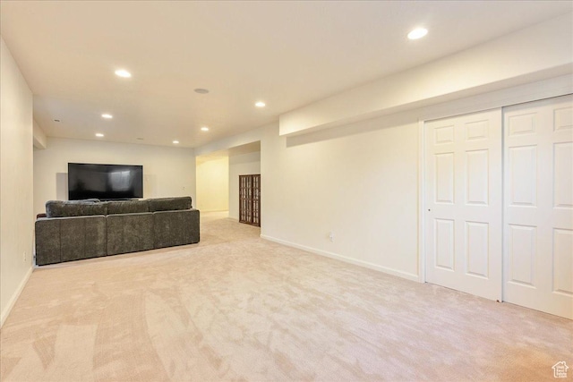 5663 W Yukon Park Ln S, Herriman, UT 84096 - unfurnished living room featuring carpet, recessed lighting, and baseboards