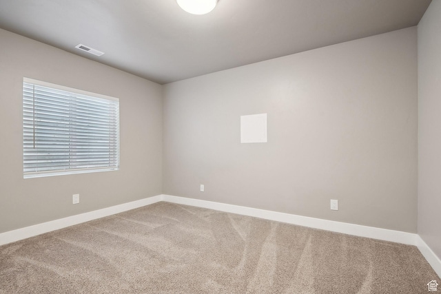 1722 W Shade Ln, Riverton, UT 84065 - spare room with visible vents, baseboards, and carpet