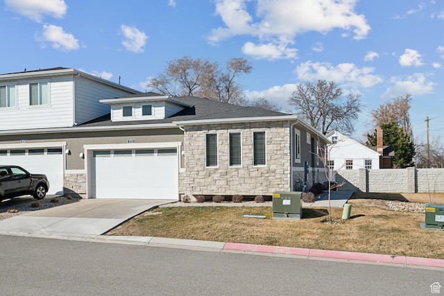 1722 W Shade Ln, Riverton, UT 84065 - view of front of property with stone siding, driveway, and fence