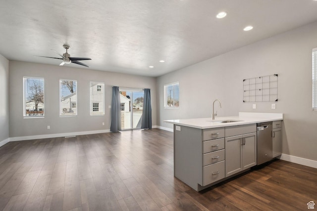 1722 W Shade Ln, Riverton, UT 84065 - kitchen with gray cabinets, a sink, light countertops, dishwasher, and open floor plan