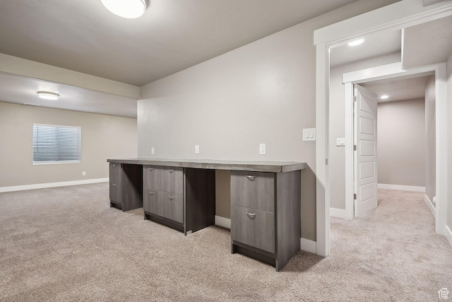 1722 W Shade Ln, Riverton, UT 84065 - interior space with light colored carpet, modern cabinets, light countertops, and baseboards