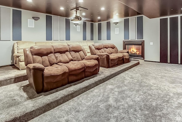 6464 Bybee Dr, Ogden, UT 84403 - carpeted home theater featuring a glass covered fireplace, recessed lighting, and visible vents
