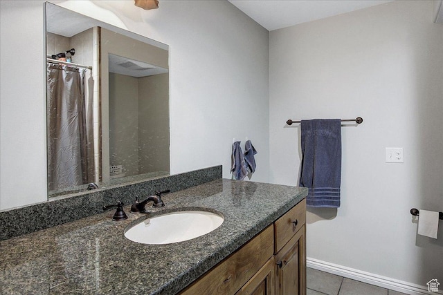 6464 Bybee Dr, Ogden, UT 84403 - full bath with vanity, tile patterned floors, curtained shower, and baseboards