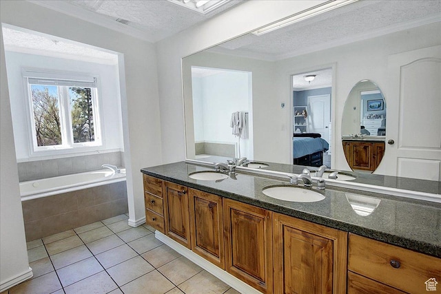 6464 Bybee Dr, Ogden, UT 84403 - full bath with a sink, tile patterned floors, ensuite bathroom, and a textured ceiling