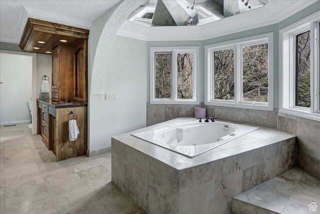 6464 Bybee Dr, Ogden, UT 84403 - bathroom featuring a textured ceiling, a bath, and ornamental molding