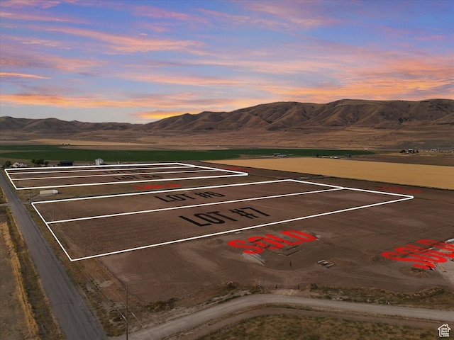 13342 N 10800 W Unit 7, Tremonton, UT 84337 - parking at dusk with a mountain view and uncovered parking