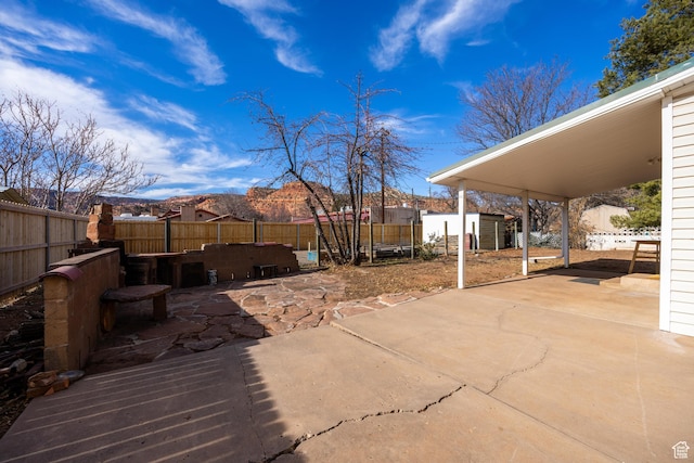 311 N 300 W, Kanab, UT 84741 - view of patio / terrace with a fenced backyard and an outdoor structure