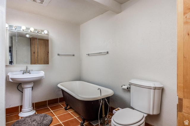 311 N 300 W, Kanab, UT 84741 - bathroom with a soaking tub, toilet, visible vents, beamed ceiling, and tile patterned flooring