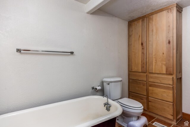 311 N 300 W, Kanab, UT 84741 - bathroom featuring toilet, a freestanding tub, and visible vents