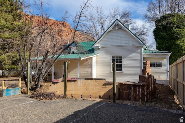311 N 300 W, Kanab, UT 84741 - exterior space with covered porch, a standing seam roof, metal roof, and fence