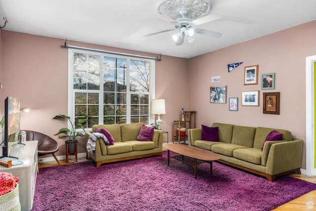 311 N 300 W, Kanab, UT 84741 - living area featuring wood finished floors, baseboards, and ceiling fan